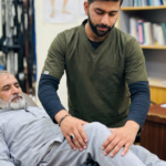 Usman performing knee isometrics